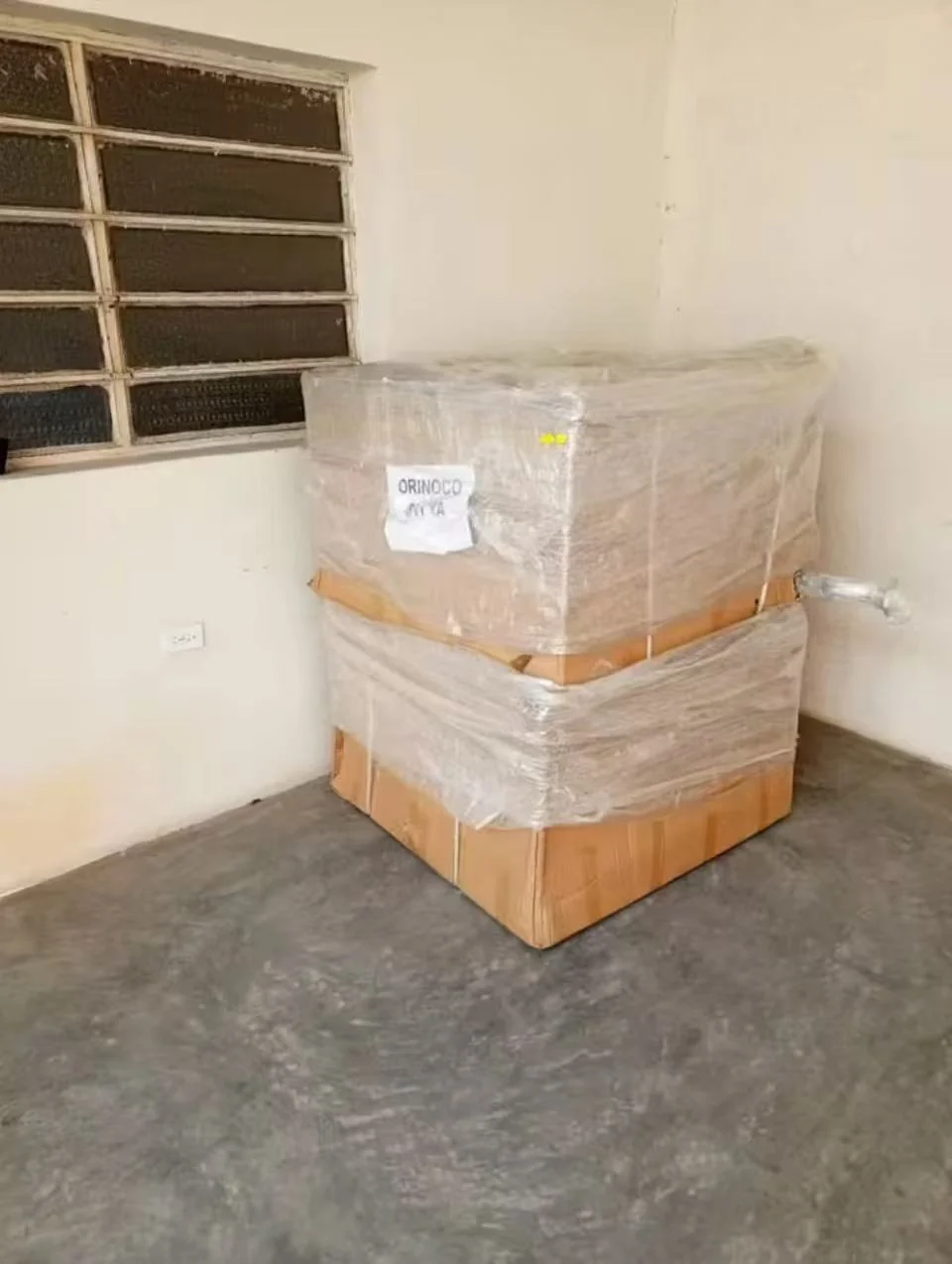 Buyer photograph: wrapped equipment delivery
