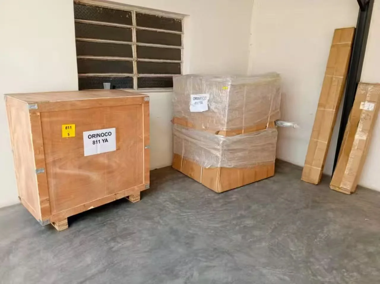 Buyer photograph: delivered equipment in crates